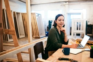 notebook and portrait with carpenter woman in workshop for craftsmanship, joinery 